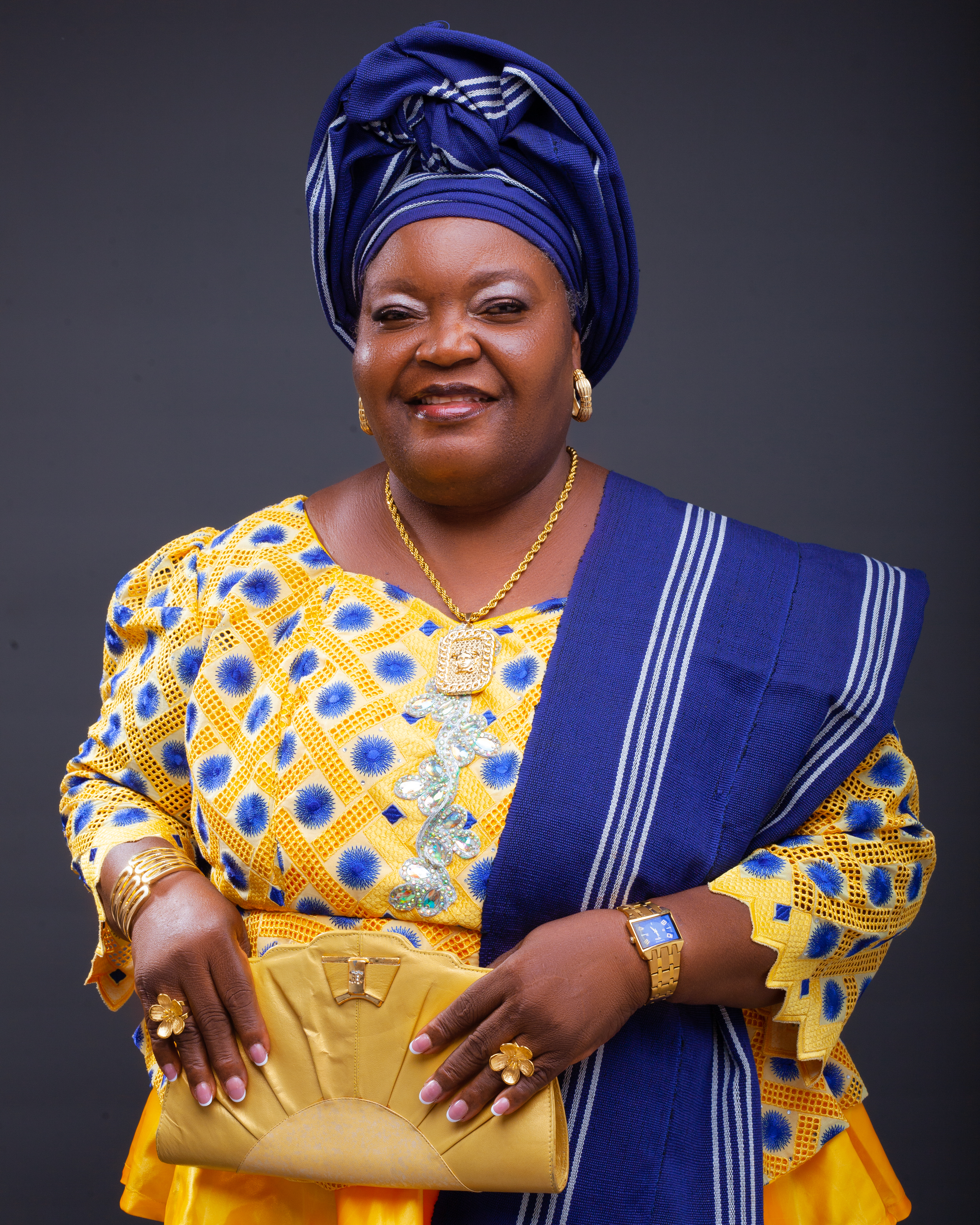 Close-up portrait of Mrs. Catherine in blue and gold outfit